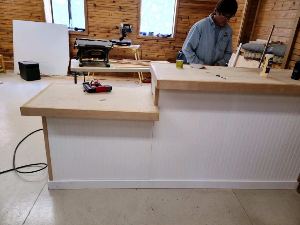 Building the front counter during a Click IT store build-out