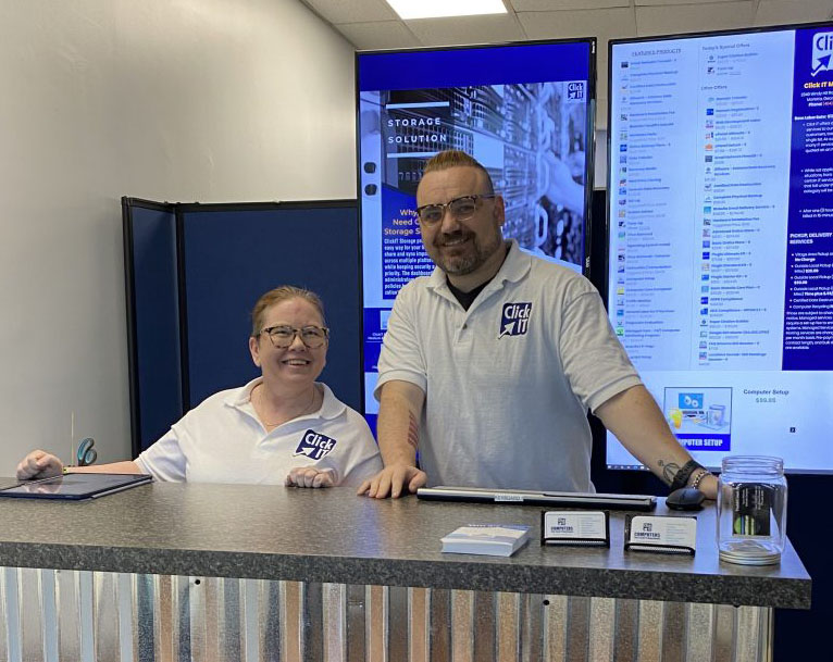 Click IT franchise owners at their store front counter